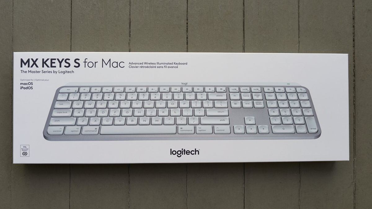 Logitech MX Keys S for Mac box, showcasing a sleek, white, illuminated wireless keyboard optimized for macOS and iPadOS.