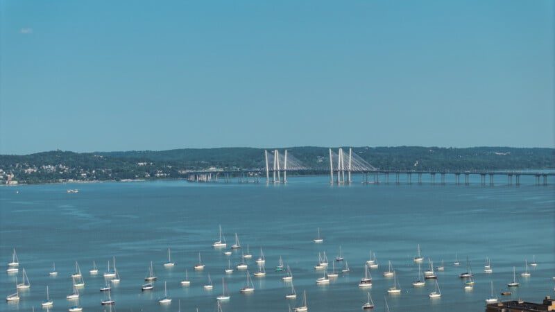 The bridge in the distance has both chromatic aberration and jagged artifacts on the support cables.