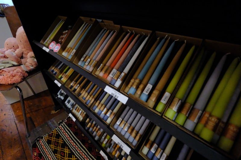 Noise becomes apparent in this shot taken in average light for a store. Note the grain in the candles to the right of the frame.